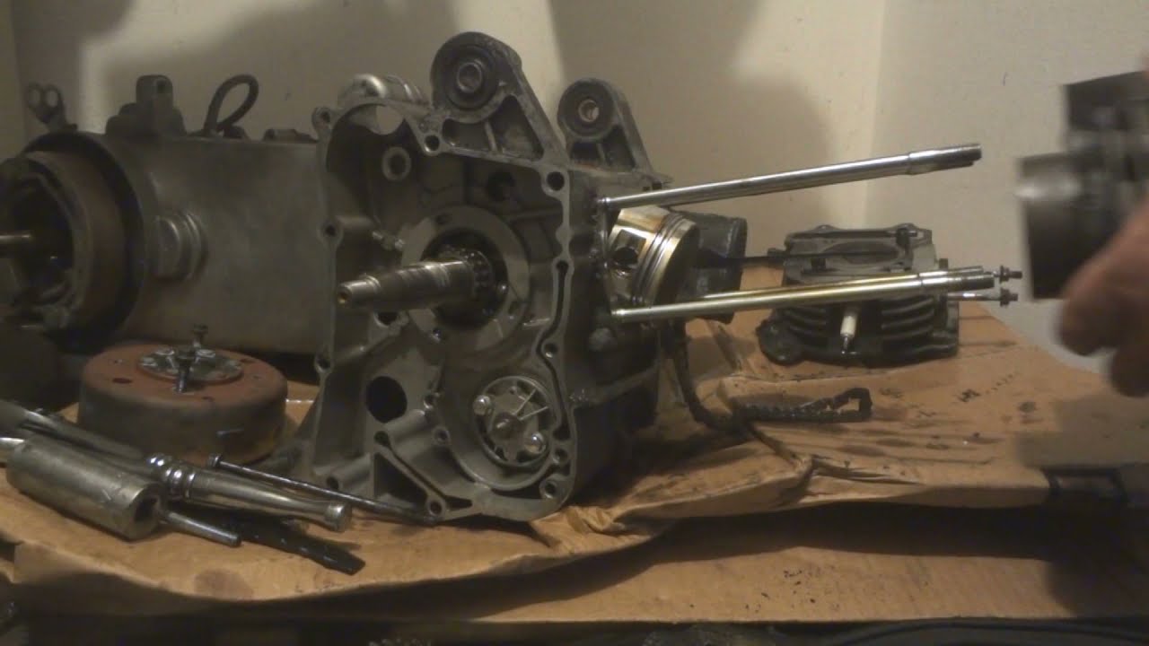 disassembling the engine of the alpha 50 moped